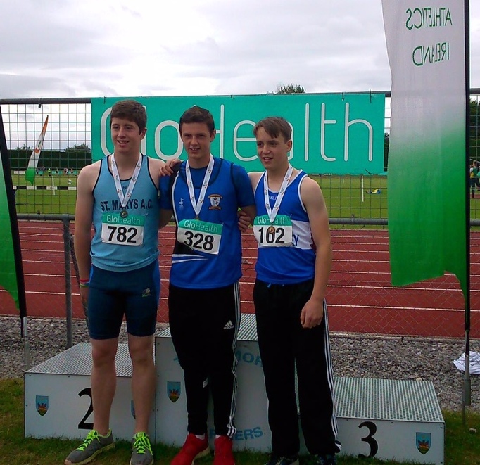 Gabriel Bell (in the centre) at Irish Juvenile Championships (Tullamore, July 2015)