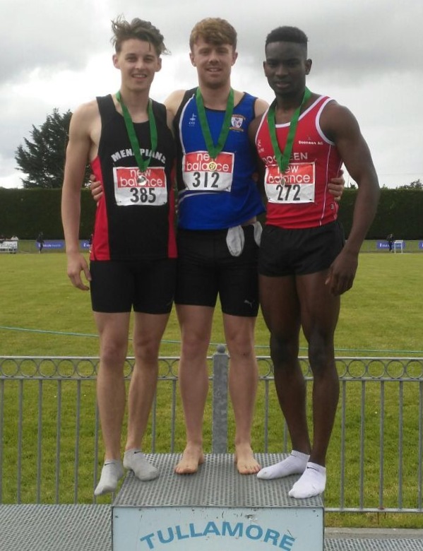 Mark Rogers (in the centre) at Leinster Senior Championships (Tullamore, June 2017)